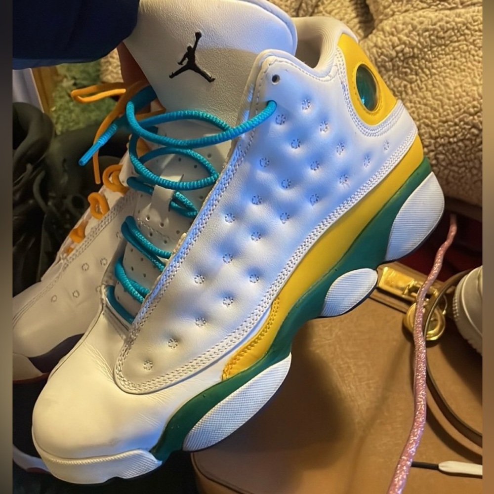 Like new white n multicolored air Jordan’s size 7youth
